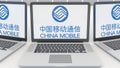 Laptops with China Mobile logo on the screen. Computer technology conceptual editorial 3D rendering