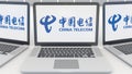 Laptops with China Telecom logo on the screen. Computer technology conceptual editorial 3D rendering