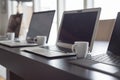Laptops and espresso lined up Royalty Free Stock Photo