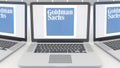 Laptops with The Goldman Sachs Group, Inc. logo on the screen. Computer technology conceptual editorial 3D rendering