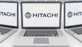 Laptops with Hitachi logo on the screen. Computer technology conceptual editorial 3D rendering