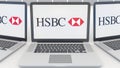 Laptops with HSBC logo on the screen. Computer technology conceptual editorial 3D rendering