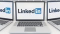 Laptops with LinkedIn logo on the screen. Computer technology conceptual editorial 3D rendering