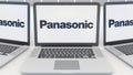 Laptops with Panasonic Corporation logo on the screen. Computer technology conceptual editorial 3D rendering