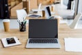 laptops and smartphone on tables