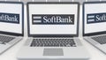 Laptops with SoftBank logo on the screen. Computer technology conceptual editorial 3D rendering