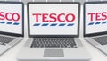 Laptops with Tesco logo on the screen. Computer technology conceptual editorial 3D rendering