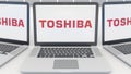 Laptops with Toshiba Corporation logo on the screen. Computer technology conceptual editorial 3D rendering