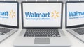 Laptops with Walmart logo on the screen. Computer technology conceptual editorial 3D rendering