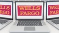 Laptops with Wells Fargo logo on the screen. Computer technology conceptual editorial 3D rendering