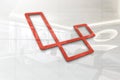 Laravel on glossy office wall realistic texture Royalty Free Stock Photo