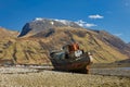 Large abandoned shipwreck on the shore of Loch Linnhe in Scotland in the afternoon Royalty Free Stock Photo