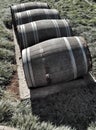 Large abandoned wine vats on grss Royalty Free Stock Photo