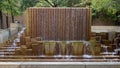 Large abstract steel fountain on the campus of the University of Texas at Arlington.