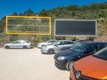 large advertising panel with nothing, just a black image, installed in a public car park in the town of Sesimbra