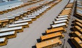 Large aerial view of a group of buses waiting in a parking lot Royalty Free Stock Photo