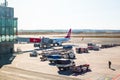 A large aircraft of the Turkish airline is preparing to board passengers through the sleeve, the view from the airport