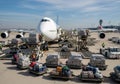 Airplane loading cargo at airport Royalty Free Stock Photo