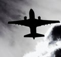 A large airplane that is flying in the sky Royalty Free Stock Photo