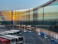 A large airport with many buses and planes Royalty Free Stock Photo