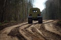 Large all-wheel drive all-terrain vehicle in the forest Royalty Free Stock Photo