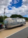 Large aluminium Airstream caravan being towed in Auistralia