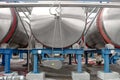 Large aluminum drums tanks and pipelines modern plant for the pr Royalty Free Stock Photo