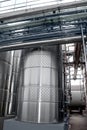 Large aluminum drums tanks and pipelines modern plant for the pr Royalty Free Stock Photo