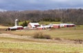 A large Amish farm with corn silos and a big field near Strasburg, Pennsylvania, U.S Royalty Free Stock Photo