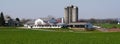 A large Amish farm with corn silos and a big field near Strasburg, Pennsylvania, U.S Royalty Free Stock Photo