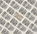 Large amount of empty pill blisters and one full for background Royalty Free Stock Photo