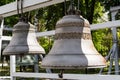 Large ancient brass bells close up.