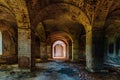 Large ancient vaulted hall of abandoned building