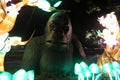 A large animatronic ape with an angry expression and lantern trees