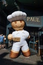 Large announcement - Free hugs sticker on large chef air statue next to the