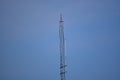 Top Of Large Antenna Tower With Antenna And Unconnected Cable At The Top Clear Blue Sky