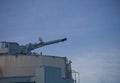 Anti-aircraft gun on a warship against the sky Royalty Free Stock Photo