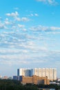 Large apartment building under blue summer sky Royalty Free Stock Photo