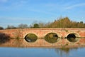 Large arched redbrick river bridge