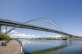 Large arched truss two-story transport Fremont Bridge over the full-flowing Willamette River in Portland Oregon Royalty Free Stock Photo