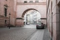 A large architectural arch on a street.