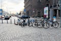 Riga, Latvia, November 2019. Bicycles parked in the city center near the promenade.