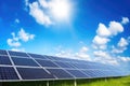 a large array of photovoltaic pannels in a green field