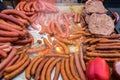 Large assortment of fried and grilled sausages and hamburgers Royalty Free Stock Photo