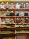 A large assortment of oriental condiments on a shelf in an oriental store, food nutrition concept, Egypt, 2019