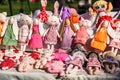 Large assortment of rag animal dolls on fall fair