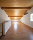 Large attic with wooden floors and exposed beams Royalty Free Stock Photo