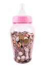 Large baby milk bottle fill with Thai baht coins money isolated on white background Royalty Free Stock Photo