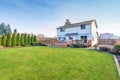 Large back yard with lots of grass and deck. Royalty Free Stock Photo