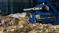 Large bales of pressed trash out of paper and plastic bottles at a recycling plant, industry, inside Royalty Free Stock Photo